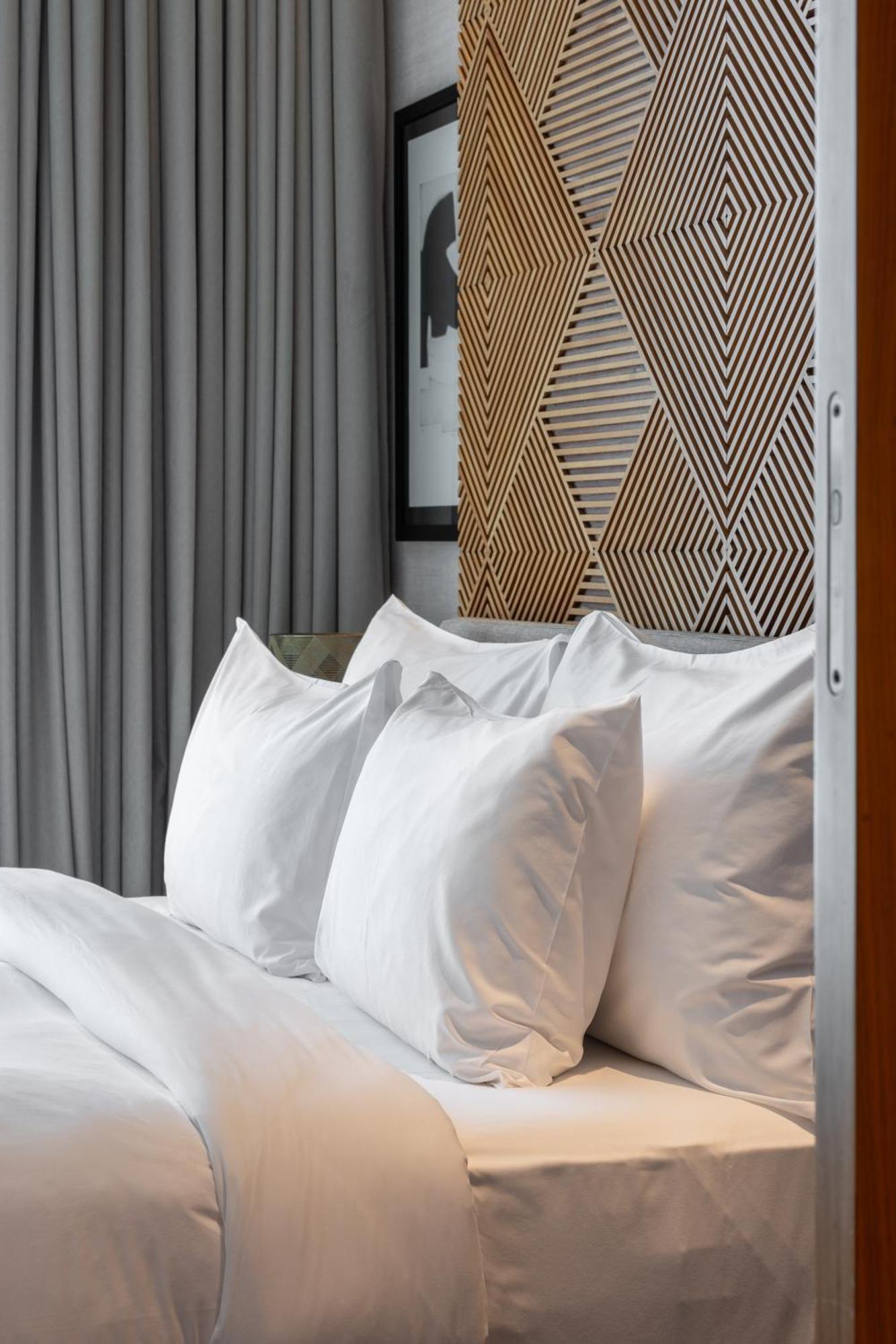 Shirvan Hotel City Yard Джидда Екстер'єр фото Pillows on a bed